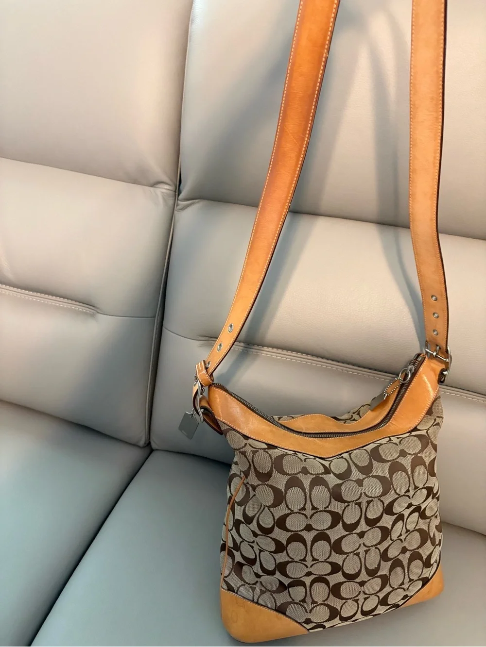 Coach Signature Canvas Shoulder Bag/Crossbody Hobo bag in Brown and Tan